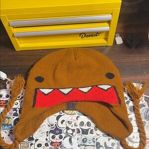 Domo 2010 Brown Knit Hat with Red and White Design